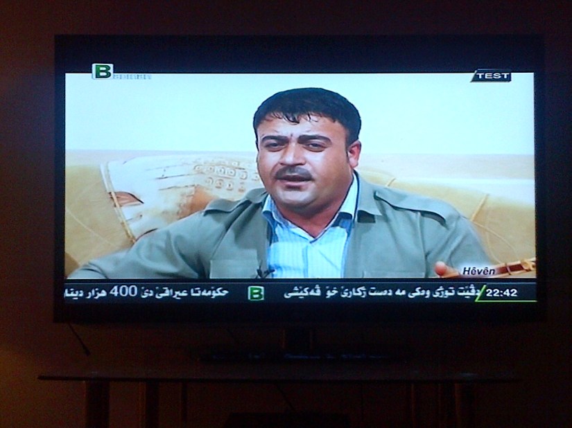 Kurdish music... A guy with a painted on moustache!